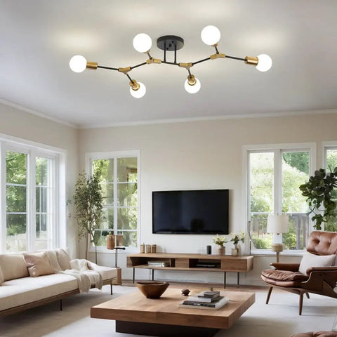 Six Light Gold And Black Sputnik Ceiling Light Fixture Modern Mid Century Vibe Semi Flush Mount in a living room setting