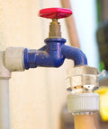 Brass Backflow Preventer Vacuum Breaker For Garden Hose With Anti Siphon Check Valve Three Quarters Inch Connection installed on outdoor faucet