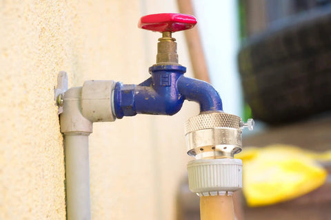 Brass Backflow Preventer Vacuum Breaker For Garden Hose With Anti Siphon Check Valve Three Quarters Inch Connection installed on outdoor faucet
