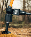 Close-up of 50HP Pro Series 3 Point Post Hole Digger With 6 Inch Auger For Cat 1 Tractors, digging into soil.