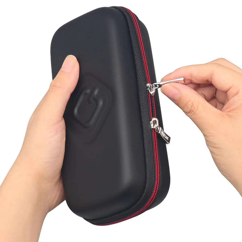 Person holding a Slick Flash Drive Case and USB Stick Organizer, showing zipper closure in black and red design for thumb drives.
