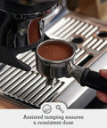 Home Barista Game Changer Smart Bean To Cup Espresso Machine With Intelligent Auto Dosing showing assisted tamping for espresso.