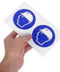 Sheet with two blue hard hat safety stickers held by hand, Hard Hat Safety Stickers For The Job Site Self Adhesive Warning Decals For Machinery