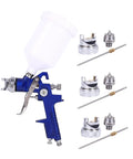 Heavy Duty Handheld Airbrush Kit With Three Precision Nozzles For A Smooth As Butter Spray Gun Finish featuring blue airbrush with cup and nozzles.