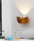 Sleek Aluminum Led Wall Sconce Light Great For Bedroom Living Room Or Hallway Modern Mount Fixture with warm glow on wall.