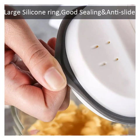 Close-up of Premium Vacuum Sealed Clear Glass Coffee Bean Canister lid with silicone ring for airtight sealing.