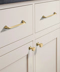 Champagne Bronze Cabinet Knobs 10 Pack Modern Drawer Pulls for kitchen cabinets, shown installed on white cabinets.