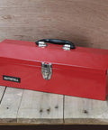 Nineteen Inch Heavy Gauge Steel Barn Tool Box With Padlock Clip Lock And Sturdy Carry Handle Includes Bonus Tote Tray For Shed Garage Badass Shop Workhorse on wooden surface.