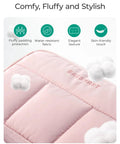 Close-up of Electronics Organizer Travel Case with fluffy quilted pink finish detailing material and texture features.