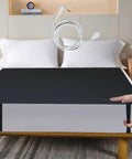 Grounding Bed Mat For Sleep Boost And Pain Relief Full Size 54 By 71 Inch Grounding Sheet With Carbon Leatherette on bed with cable