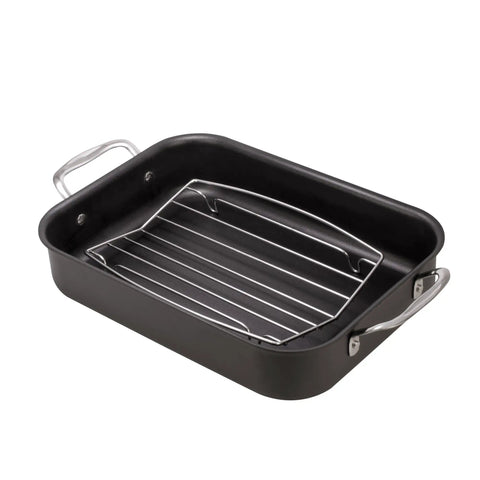V-Shaped Roasting Rack For Even Heat In The Oven, Chrome Plated Steel, Fits Smaller Pans, 8 x 10.375 x 1.5 Inches, in a black pan.