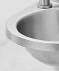 Close-up of wall mounted stainless steel hand wash basin for small spaces, durable 304 stainless sink with easy clean design.