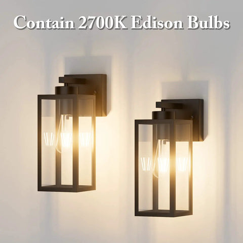 Two Pack Black Outdoor Wall Lanterns With Clear Glass Shade For Entryway Porch And Doorway Exterior Wall Sconces E26 Bulbs Included 2700K Dimmable With Compatible Dimmer lit against a wall
