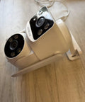 Dual Lens Outdoor Wifi Security Camera Offers Crystal Clear 2.5K Footage and Rock Solid Connectivity to Keep Tabs On Your Property featuring sleek design.