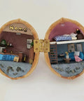 Top Shelf 50 Pack Mini Brass Hinges With A Seamless 180 Degree Swivel For Micro Crafts And Tiny Cabinet Fixes used in a miniature walnut diorama.