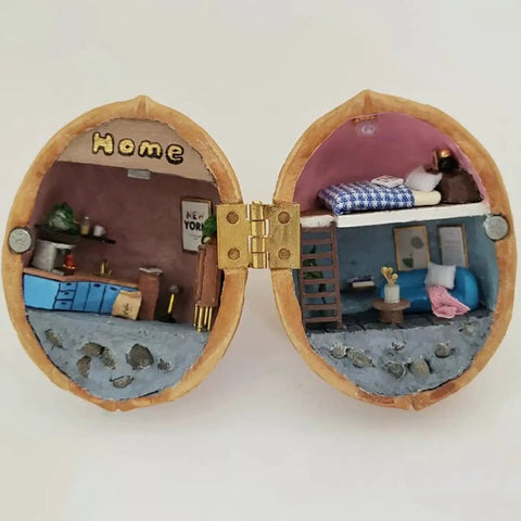 Top Shelf 50 Pack Mini Brass Hinges With A Seamless 180 Degree Swivel For Micro Crafts And Tiny Cabinet Fixes used in a miniature walnut diorama.