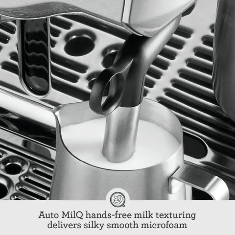 Level Up Your Daily Grind With This Pro Grade Bean To Cup Espresso Machine Featuring A Built In Grinder Automatic Milk Steamer And Sophisticated Black Truffle Design, close-up of Auto MilQ milk texturing pitcher.