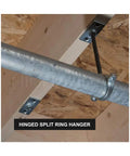 Hinged Split Ring Pipe Hanger One And A Half Inch Galvanized Iron With Three Eighths Inch Rod Fitting in workshop ceiling