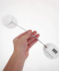 Hand holding Kid Proof Fridge And Cabinet Lock With Password Protection, White Plastic Babyproof Lock for safety in kitchens