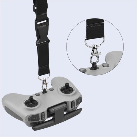 Close-up of an adjustable nylon lanyard attached to DJI Avata FPV Remote, shown in black with metal clasp.