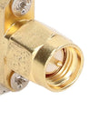 Close-up of a gold SMA connector on a 915MHz Bandpass Receiver Filter With SMA Interface, 26MHz Bandwidth, Broad Compatibility.