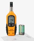 Handy All In One Digital Hygrometer And Psychrometer With Dew Point And Wet Bulb Readouts displayed with 9V battery and manual on white background