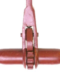 Close-up of Beefy Ratchet Chain Binder With 2600 Pound Load Capacity LDR 14, partially showing central gear and lever mechanism.