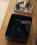 Bathroom Sink Retro Countertop Basin Household Ceramic Wash Basin Bathroom Wash Basin Personalized Hand-Carved Pattern Sink Bathroom Sink Vessel on a wooden surface.