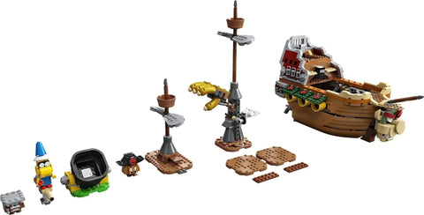 Bowser's Airship Expansion Set for Super Mario buildable ship with unfolding interior and figures shown unassembled on white background