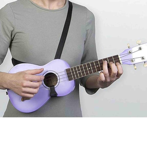 Person wearing Cross Chest Sling For Ukuleles, Mandolins, Classical Guitars And More, Adjustable For Any Size Instrument with gray shirt