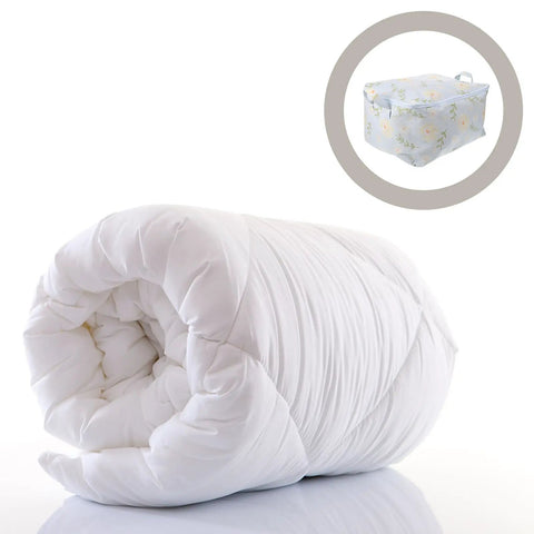 Level Up Your Storage With This Heavy Duty Cotton Quilt Bag Featuring Secure Zipper Seals and Sturdy Handles to hold rolled white quilt.