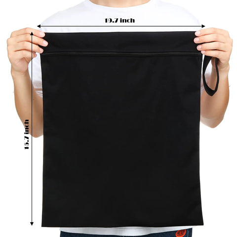 Person holding black Two Pack Large Travel Laundry Bags Waterproof Wet Dry Bag For Suitcase Beach Gym Swimsuit Clothes College Dorm
