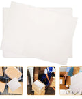 100 Sheets Newsprint Packing Paper for Moving and Shipping, displayed on boxes and during packing processes, versatile white paper sheets