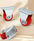 Three 1-inch rigid caster wheels with red rubber wheels and metal mounting plates