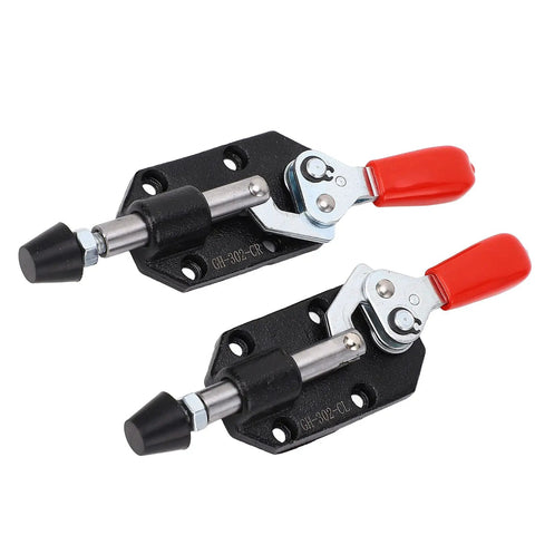 Rock Solid Two Pack Push Pull Toggle Clamps With Comfy Vinyl Grip Handles Rust Proof Cast Iron Frame Lightning Fast Quick Release Lever For Zero Hassle Woodworking And DIY Bench Work 20Mm Stroke on a black base with red handles.