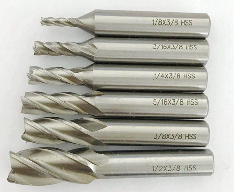 Six-piece end mill set, center-cutting, 4-flute HSS, sizes 1/8, 3/16, 1/4, 5/16, 3/8, 1/2 in with 3/8 in shank