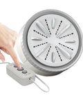 Compact Mini Washing Machine Portable USB Powered Clothes Washer No Sweat Deep Clean with control panel and hand.