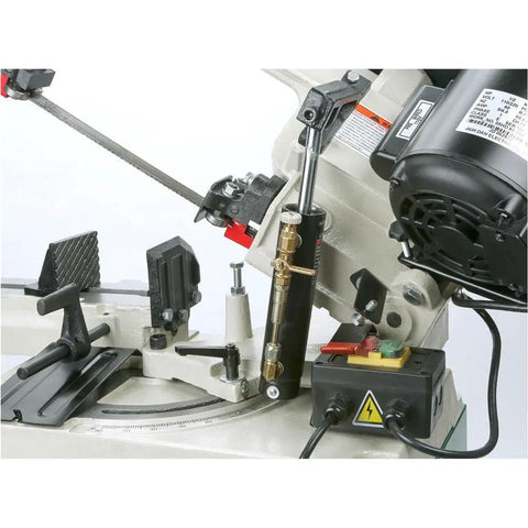 Badass Metal Cutting Bandsaw With Swivel Head And Five By Six Inch Cutting Capacity Powered By Rock Solid Half Horsepower Motor Running Clean On 110V Or 220V For Smooth Shop Chores