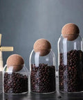Lock In Freshness Straight Up With This Round Glass Tea Canister Boasting A Tight Cork Seal And Heat Resistant Build Ideal For Storing Coffee Beans Sugar Salt Or Loose Leaves While Looking Sharp On Counters.