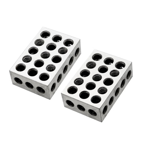 Two silver metal 1x2x3-inch parallel blocks with threaded holes