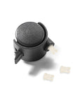 Close-up of a black swivel wheel caster with three white Plastic Caster Socket Inserts 10-Pack, Swivel Caster Stem Sleeves For Office Chair Feet.