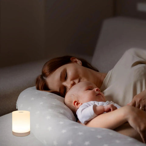 Touch Night Light For Nursery And Bedroom Cordless Battery Powered Dimmable Lamp near mother and baby in dimly lit room