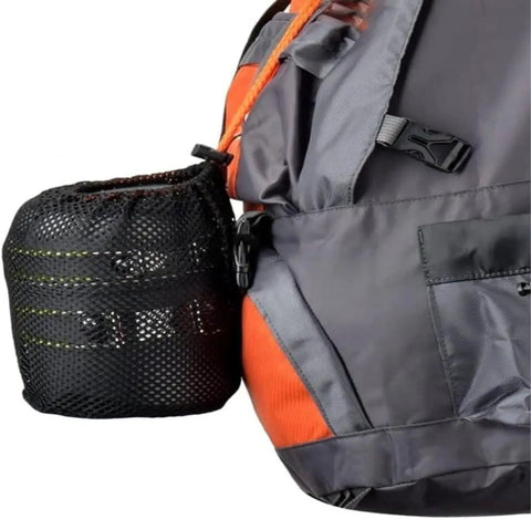 Camping Cookware Set For 1 To 2 People in mesh bag attached to backpack, showing compact outdoor cooking kit for trekking and travel
