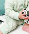 Dope Magnet Building Blocks Kit For Kids Includes Stunt Arena Construction Pieces being played with by a child in pajamas.