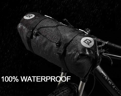 Built To Last Bikepacking Handlebar Bag 7 To 14 Liter Waterproof Dry Pack for MTB and Road Bikes shown on bike under rain