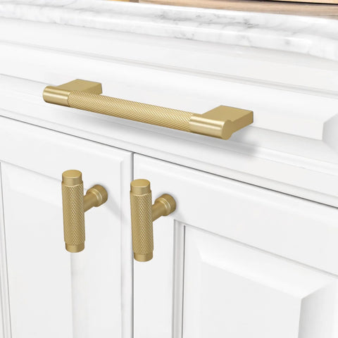 10 Pack Brushed Brass Knurled Cabinet Handles 5 Inch Center to Center gold pulls installed on white cabinet