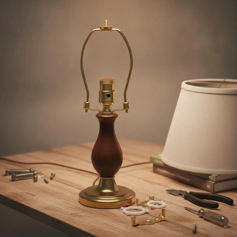 Gold Metal Lamp Stand Bracket Set with Horn Style Mount and Adapters for Table and Floor Lamps alongside tools and fittings.