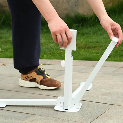 Adjustable Portable Foldable Beach Anchor Base being set up, showing collapsible design, on patio, fits sunshade stand and umbrella