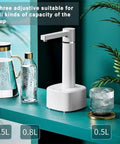 Desktop Water Dispenser With Hot And Cold Water, USB Charging, Electric ABS Pump, shown with three cups, green backdrop