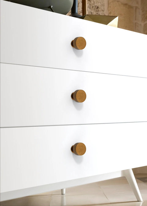 Antique Brass Cabinet Knobs 10 Pack 28mm Round Single Hole Drawer Pulls for Kitchen Cabinets and Furniture shown on white dresser
